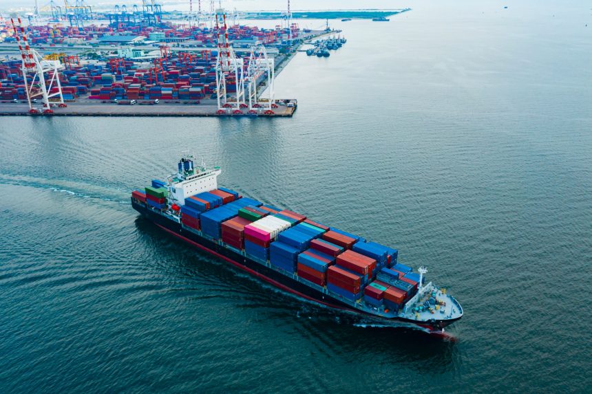 Aerial view cargo ship transportation of business logistic sea freight, Cargo ship, Cargo container in factory harbor at industrial estate for import export around in the world, Trade Port / Shipping Maritime: la reconstruction de la flotte marocaine
